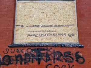 smashed window boarded